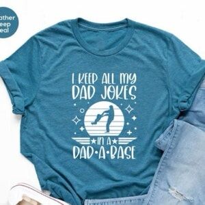 RUSTIC UNITED Unisex Graphic Tee I KEEP ALL MY DAD JOKES IN A DAD-A-BASE NWOT